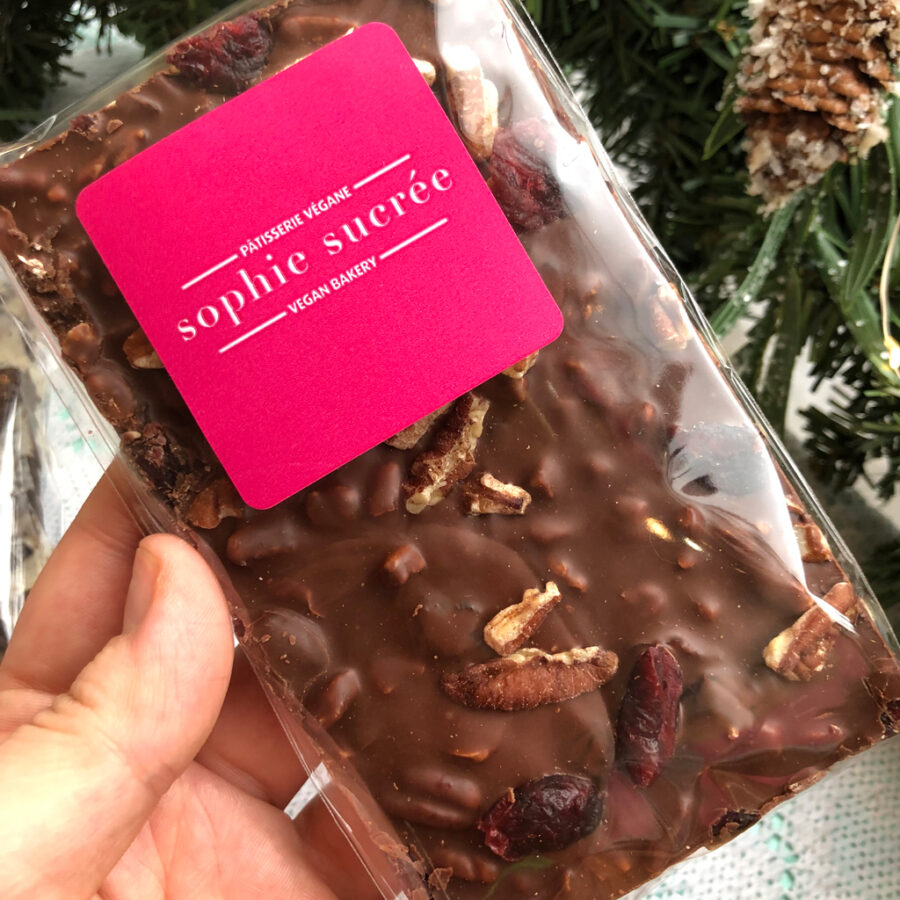 take a bite of this Fruit 'N' Nut Chocolate Bar at Sophie Sucree vegan bakery in Montreal